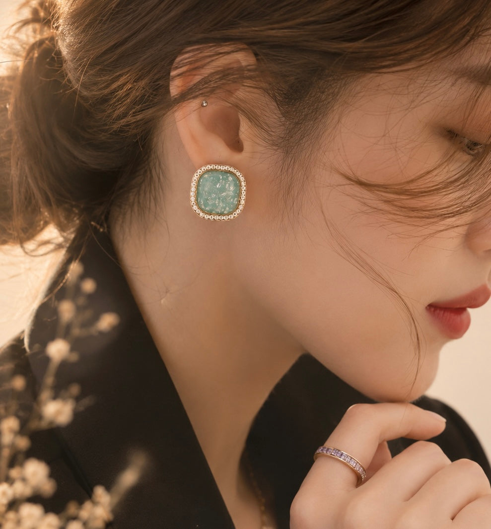 Icy Blue Glow Stud Earrings