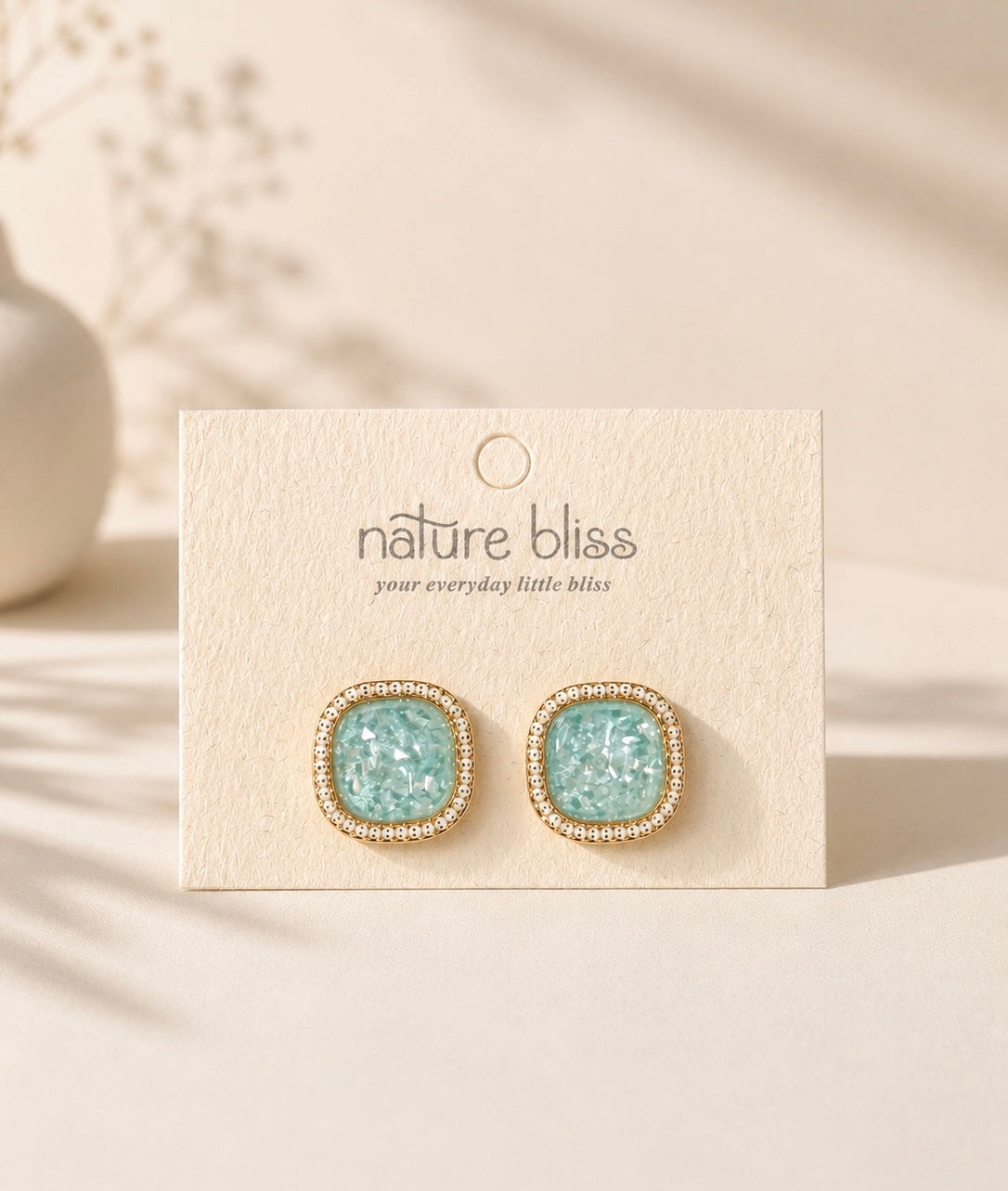 Icy Blue Glow Stud Earrings
